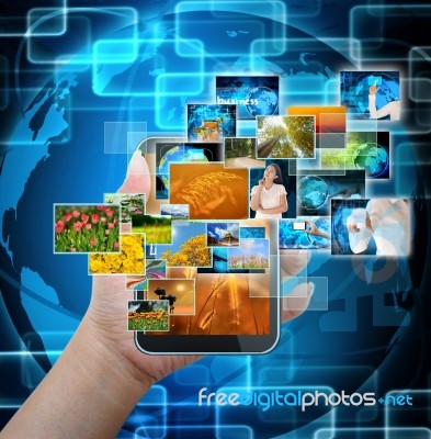 Holding Mobile Smart Phone With World Technology Background Stock Photo