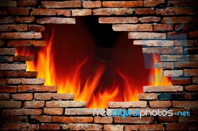 Hole Wall And Fire Stock Photo