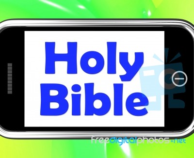 Holy Bible On Phone Shows Religious Book Stock Image