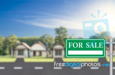Home For Sale With Green For Sale Sign Stock Photo