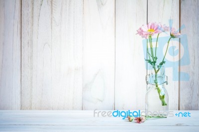 Home Interior Decor,bouquet Of Pink Flowers In A Vase On White Wood Table  Background Stock Photo