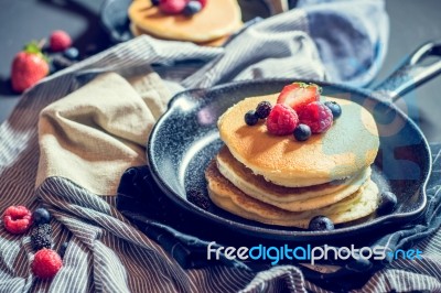 Home Made Pancakes With Berries On Metal Frying Pan Decorated Wi… Stock Photo