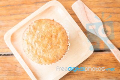 Homemade Banana Cupcake On Wooden Plate Stock Photo