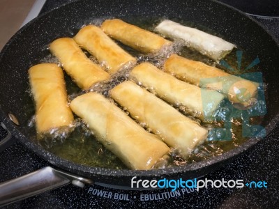 Homemade Deep Frying Spring Rolls Stock Photo