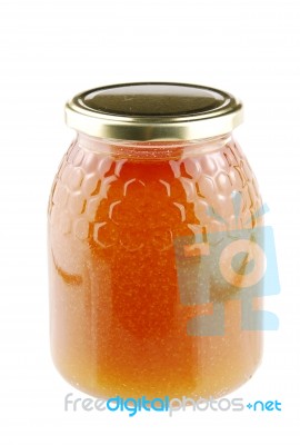 Homemade Honey In A Glass Jar On White Stock Photo