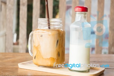 Homemade Iced Coffee Latte On Wooden Table Stock Photo