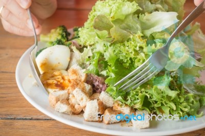 Homemade Salad Serving On Wooden Table Stock Photo