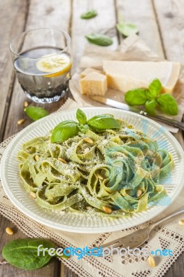 Homemade Spinach Pasta With Pesto And Parmesan Cheese Stock Photo