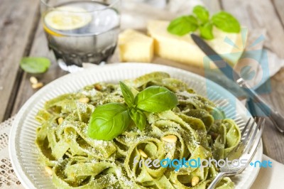 Homemade Spinach Pasta With Pesto And Parmesan Cheese Stock Photo