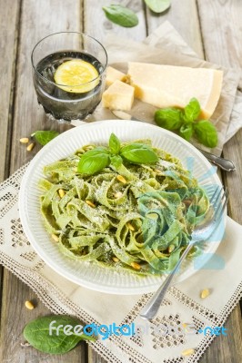 Homemade Spinach Pasta With Pesto And Parmesan Cheese Stock Photo