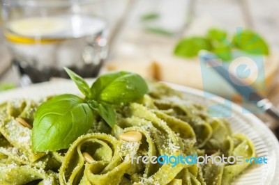 Homemade Spinach Pasta With Pesto And Parmesan Cheese Stock Photo