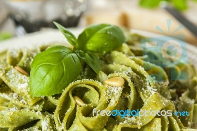 Homemade Spinach Pasta With Pesto And Parmesan Cheese Stock Photo