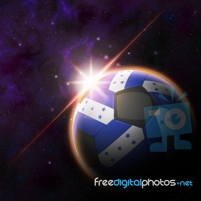 Honduras  Flag On 3d Football With Rising Sun Stock Image