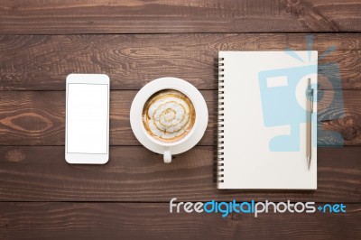 Hone Coffee And Book Blank On Wood Table Top View Stock Photo