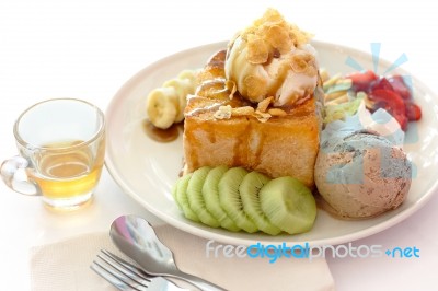 Honey Toast And Whipping Cream With Ice Cream On White Stock Photo