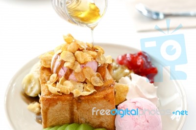 Honey Toast And Whipping Cream With Ice Cream On White Stock Photo