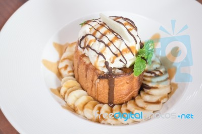 Honey Toast With Banana And Ice Cream Stock Photo