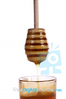 Honey With Dipper Stock Photo