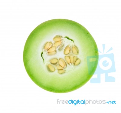 Honeydew Melon Sliced In Half Isolated On White Stock Photo