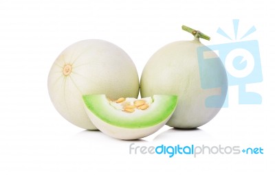 Honeydew Melon Sliced In Half Isolated On White Stock Photo