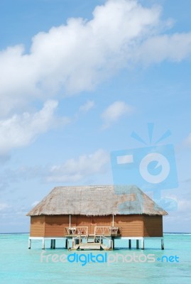 Honeymoon Villa In Maldives (clouscape Background) Stock Photo