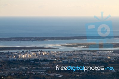 Horizon View Of Olhao Coastline Stock Photo