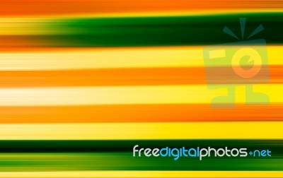 Horizontal Green And Orange Motion Blur Background Stock Photo