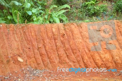 Horizontal Red Cliff Of Small Level Ground Dig A Well Stock Photo