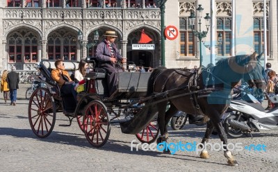 Horse And Carriage In Market Square Bruges West Flanders In Belg… Stock Photo