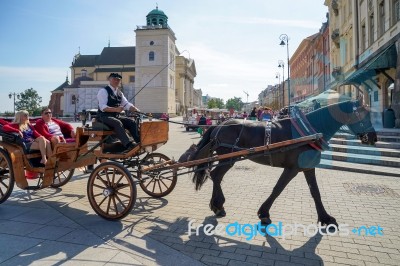 Horse And Carriage In The Old Market Square In Warsaw Stock Photo