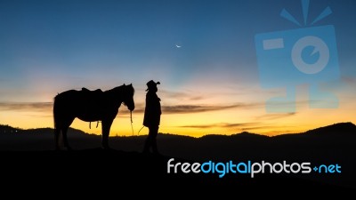 Horsemen At Mount Bromo Sunrise Stock Photo