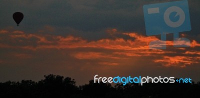 Hot Air Balloon In A Sunset Stock Image