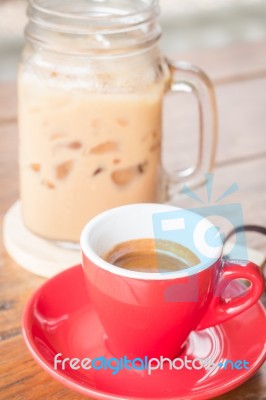 Hot And Cold Coffee On Wooden Table Stock Photo