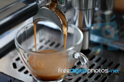 Hot Coffee From Espresso Machine Stock Photo