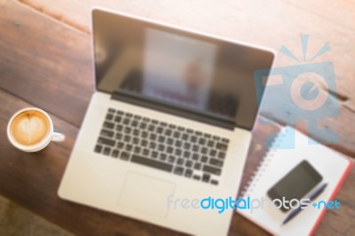 Hot Coffee Latte Cup On Working Table Stock Photo