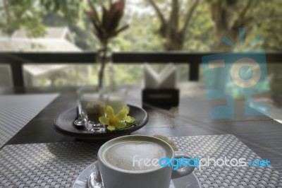 Hot Coffee Latte On Balcony Wooden Table Stock Photo