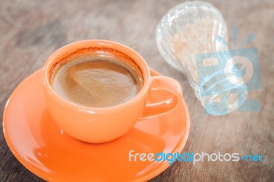 Hot Coffee On Wooden Table Stock Photo