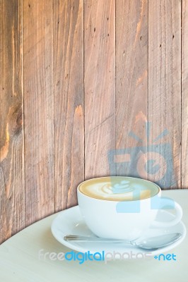 Hot Cup Of Coffee Latte On Wooden Background Stock Image