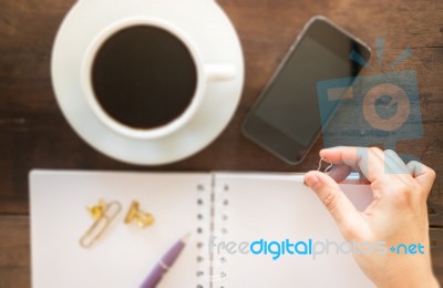 Hot Cup Of Coffee On Wooden Work Table Stock Photo