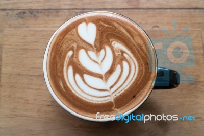 Hot Cup Of Latte Art Coffee Stock Photo