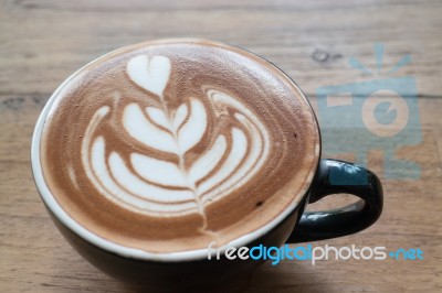 Hot Cup Of Latte Art Coffee Stock Photo