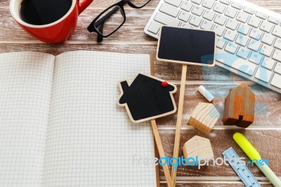 House Sale And Rent Sign With Blank Notebook Stock Photo