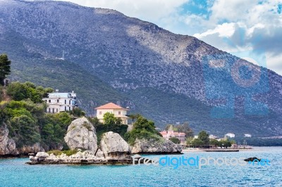 Houses Rocks And Mountain At Greek Sea Stock Photo