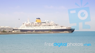 Huge Ship Docked In Sea Port Stock Photo