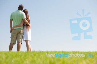 Hugging Young Couple Stock Photo