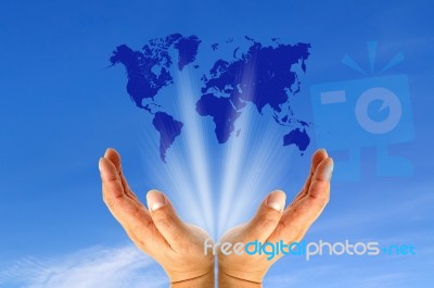 Human Hands Holding World Map Stock Photo