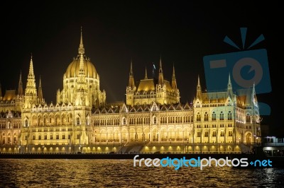 Hungarian Parliament Building Illumintaed At Night In Budapest Stock Photo