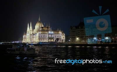 Hungarian Parliament Building Illumintaed At Night In Budapest Stock Photo