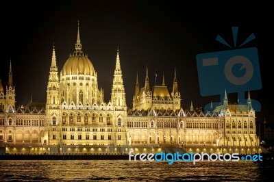 Hungarian Parliament Building Illumintaed At Night In Budapest Stock Photo