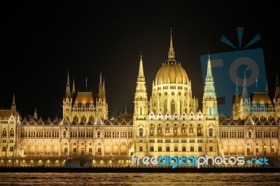 Hungarian Parliament Building Illumintaed At Night In Budapest Stock Photo